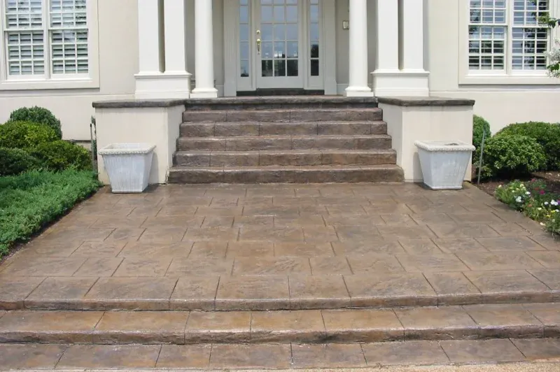 Decorative concrete stained steps and porch.