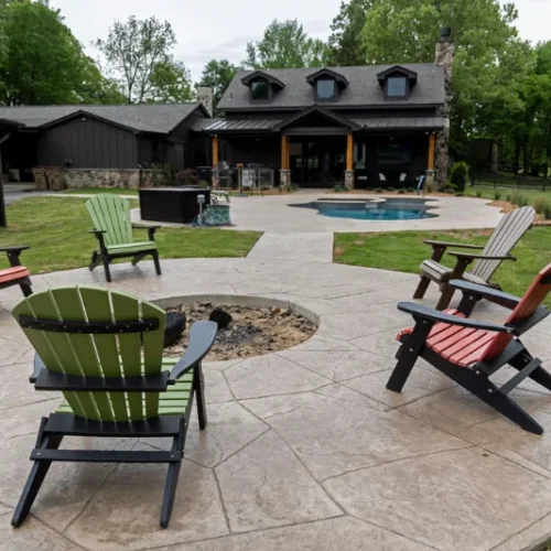 Outdoor firepit with stamped and stained concrete